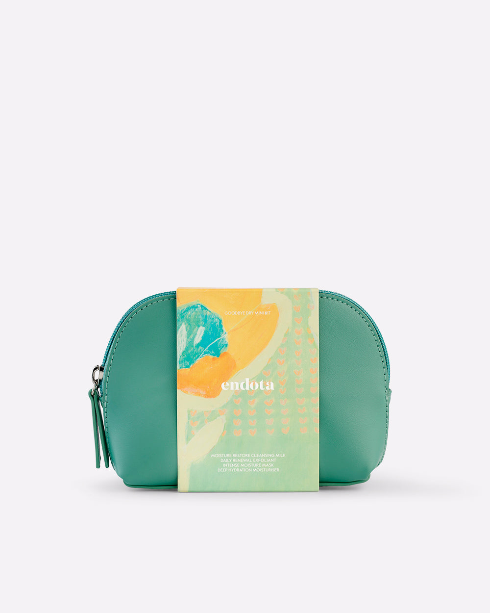 A mint green leather zippered skincare pouch with a decorative paper band around the middle featuring the brand name 'endota' and abstract orange and teal artwork, set against a plain light grey background.
