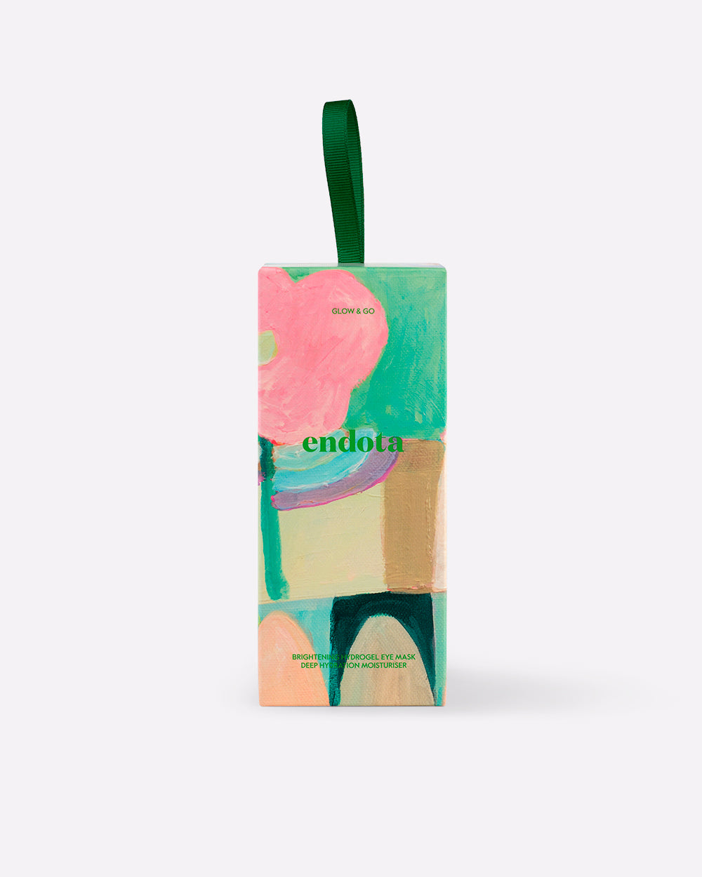 endota Go & Glow skincare bon bon gift box featuring a colorful abstract painting design with a green hanging ribbon, set against a plain light grey background.